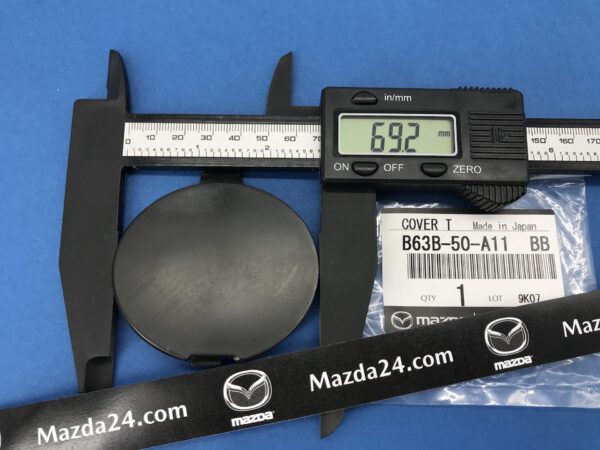 2017-2018 Mazda 3 front bumper tow took cover dimensions (width). Part numbers: B63B50A11BB, B63B-50-A11BB.