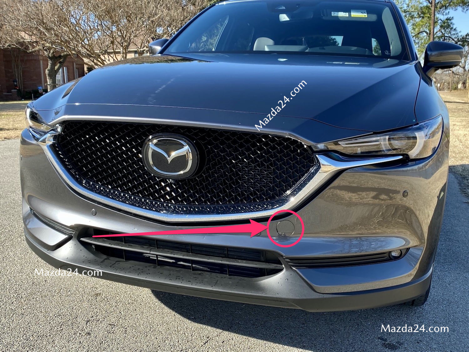Mazda CX-3 front bumper tow hook cover