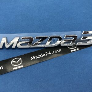 BHN951721 - 2014-2018 Mazda 3 hatchback trunk lid badge (model name)