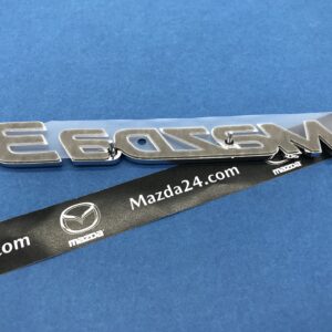BHN951721 - 2014-2018 Mazda 3 hatchback trunk lid badge (model name)
