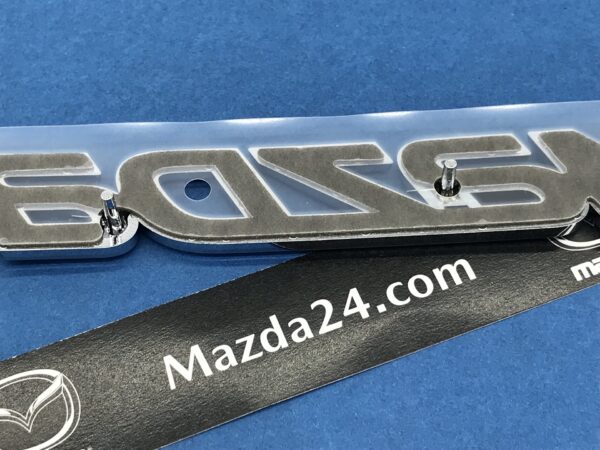BHN951721 - 2014-2018 Mazda 3 hatchback trunk lid badge (model name)