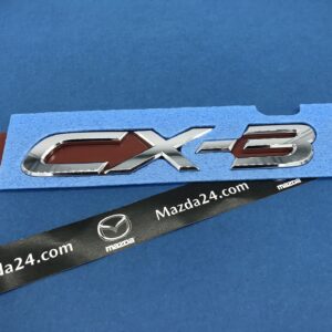 D10J51721 - Mazda CX-3 trunk lid badge (model name)