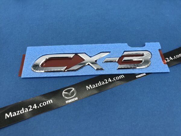 D10J51721 - Mazda CX-3 trunk lid badge (model name)