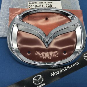 D11B51730 - Mazda CX-3 trunk lid emblem (Mazda logo)