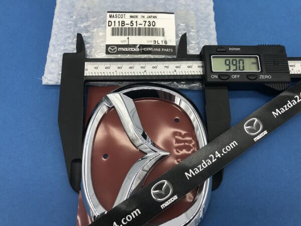 D11B51730 - Mazda CX-3 trunk lid emblem (Mazda logo)