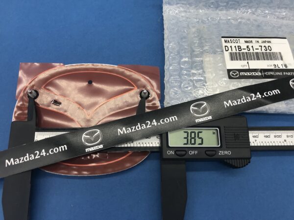 D11B51730 - Mazda CX-3 trunk lid emblem (Mazda logo)