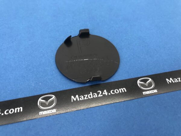 DK8A50A11ABB - Front bumper cover towing cap Mazda CX-3