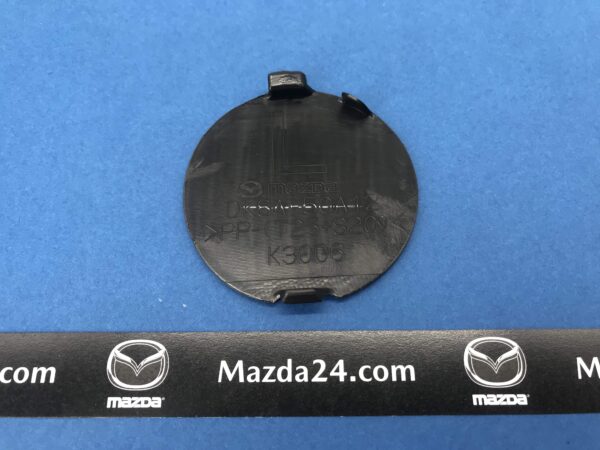 DK8A50A12ABB - Front bumper cover towing cap left Mazda CX-3