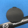 KD5350EL1A - Mazda CX-5 rear bumper tow hook cover left