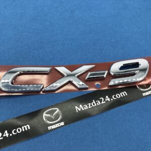 TK7851721A - Mazda CX-9 TC (2016-2021) trunk lid badge (model name)